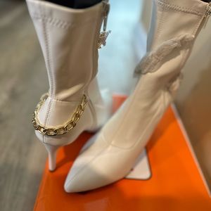 White 2 -inch heel calf boots, brand new, size 11